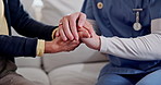 Comfort, nurse and old woman in home with holding hands, understanding or empathy in elderly care. Compassion, patient or caregiver with security, retirement support and trust in medical assistance.