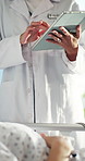 Hospital, tablet and doctor with patient in bed for consulting, medical service and surgery checkup. Healthcare, clinic and people with tech, online results and research for diagnosis, review or care