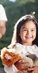 Walking, teddy bear and kid outdoor by new home for moving, real estate or relocation. Happy, plush toy and girl with stuffed animal for comfort, development or growth with childhood memory at house.