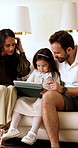 Parents, child and tablet with game on sofa for problem solving, development or bonding activity. Learning, family or kid with tech in home for playing online puzzle, digital literacy or relationship