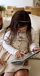Father, child and help in house with tablet, education app and learning to play online game together. Man, daughter and scroll in living room with tech, browsing and knowledge for gaming website.