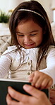 Parent, child and happy with tablet on sofa for internet game, development and bonding activity. Learning, family and kid with tech in home for playing online puzzle, digital literacy or relationship