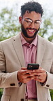 Employee, glasses and happy man with phone, city or chatting with contact for real estate investment. Typing, message and business person with mobile, realtor and communication on social media app