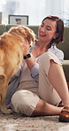 Love, happy woman and playing with dog in home for bonding, pet adoption and connection. Loyalty, owner care and stroke furry best friend in living room for affection, domestic companion and comfort