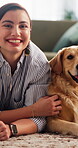 Face, woman and relax with dog on carpet for domestic companion, bonding and furry best friend. Weekend break, golden retriever and happy owner in home for pet care, canine rescue and animal adoption
