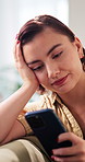Reading, phone and woman on sofa for social media, online chat and message for contact on weekend. Home, relax and person on mobile app for connection, networking and notification for communication