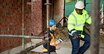 Walking, tablet and construction workers on site for inspection, building or maintenance on house. Digital technology, men and civil engineer with contractor for renovation, repairs or planning.