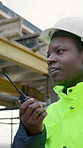 Architect, talking and man with radio on construction site, project management and renovation plans. Outdoor, civil engineer and black person with tech for communication, smile and building update
