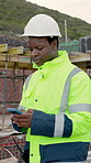 Architect, chat and man with phone on building site, thinking and communication with contact on web. Civil engineer, smile and black person with mobile, reflection and typing message on social media