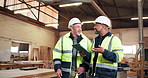 Carpenter, team and planning in workshop with tablet, discussion and idea for woodwork production. Mature people, walk and conversation in warehouse with tech, DIY manufacturing or carpentry project