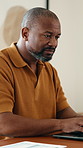Laptop, typing and black man in home with remote work for finance report with budget plan. Computer, email and mature financial manager with freelance career for investment advice, feedback or tips.