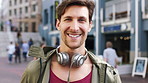 Happy, tourist and face of man in city with headphones for travel, holiday and weekend abroad. Smile, tourism and portrait of person in town for vacation, sightseeing and explore on trip in Germany