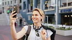 Tourist, happy and woman with selfie in city for social media, online post and memory for travel blog. Town, smile and person with picture, photo and update for holiday, vacation and weekend abroad