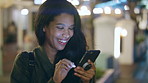 Woman, phone and texting at night in town with contact, online dating or funny meme on travel. Girl, laugh and check notification for transport, mobile app and happy on social media in urban city