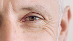 Face, vision and senior with closeup of eye for retina health, optometry and lens prescription test. Ophthalmology, iris and perception with elderly person for cornea, focus and ocular screening