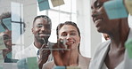Business, people and writing on glass in meeting for training, planning and schedule for accounting. Team, discussion and notes in office for coaching, brainstorming and ideas for investment proposal