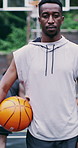 Confidence, face or man on basketball court with ball, fitness hobby or practice in weekend match. Pride, bounce or player with equipment, hoop sport and training session with athletic competition.