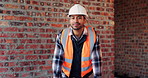 Construction, face and thinking with man on building site for laughing or project management. Funny, hardhat and smile with thoughtful person on worksite for property development as architect