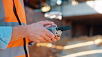 Construction, control or hands on worksite with drone, structure or progress track in architecture check. Space, man or engineer with tech, site review or industrial evaluation in remote inspection.