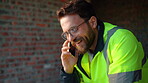 Talking, smile or man with phone call at construction site, confirm material order or project feedback. Discussion, mobile or engineer with update for building timeline, property progress or space