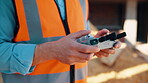 Construction, review or hands on site with drone, structure or hazard check in progress tracking. Architecture, man or engineer with tech, safety monitor or industrial evaluation in remote inspection