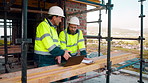 Team, discussion and laptop on construction site with clipboard, engineering plan and manager advice. Project management, people and talk outdoor with computer, checklist and engineer for renovation.