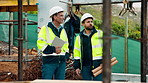 Construction, team and talk on site with inspection, tablet or engineering plan for building project. Infrastructure, engineer and men outdoor with tech, strategy or discussion for quality assurance.