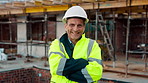Crossed arms, smile and face of construction worker on site with confidence for industrial career. Man, about us and portrait of mature civil contractor with pride for infrastructure of building.