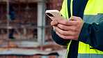 Architect, typing and hands with phone at construction site, research or communication with contact. Civil engineer, outdoor and person with mobile for chat, online and plan for property development
