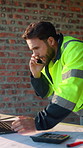 Construction, laptop and phone cal with man on building site for planning or property development. Communication, computer and typing with person on worksite for architecture or project management