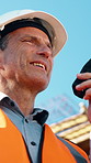 Construction, review or man on site with radio, stock delivery or inspection update in chat. Contact, low angle or mature engineer with tech, progress report or resource planning in communication.