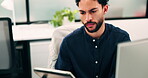 Tablet, reading and man with computer in office, testing and software backup for feature integration. Review, smile and web developer with tech for maintenance update, interactive bot and ai for site