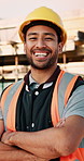 Architect, face and happy man with arms crossed on construction site for building development. Portrait, male person or civil engineer with smile or confidence for architecture, maintenance or safety