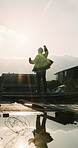 Back, construction or man in celebration on site for foundation finish, inspection pass or goals. Reflection, flare or excited worker with fist pump for building progress, compliance success or space