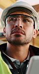 Thinking, man and construction worker on site with tablet for email with feedback on building approval. Digital technology, goggles and male civil engineer with review for planning home renovation.