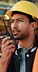 Construction site, talking and man with radio for communication, feedback and update. Architecture, engineering and person with instructions for building, renovation and planning for infrastructure