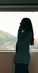 Business, laughing and phone call with woman at workplace in city for conversation or update. Communication, feedback and funny with happy employee in office for advice, consulting or contact