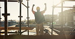 Winner, engineer and back of man on construction site for celebration, goals and excited contractor. Building inspection, success and architecture with person project approval and target for progress