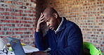 Building, laptop and stress with black man on construction site for planning or problem solving. Anxiety, computer and typing with architect on worksite for engineering delay or project management