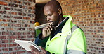 Civil engineer, thinking and man with tablet in construction site, research or property development. Happy, architect and person with tech, reflection and planning for building renovation with info