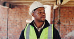 Walking, black man and inspection on construction site for planning, infrastructure and property. Architecture, civil engineering and worker for building development, renovation or remodeling project