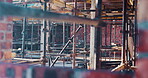 Building, framework and scaffolding on construction site for civil engineering or property development. Architecture, industrial and project with support structure outdoor for improvement or progress