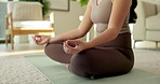 Hands, meditation and woman in home for yoga, mindfulness and zen for spiritual healing. Female person, yogi and fitness in living room with lotus pose, inner peace and holistic balance for self care
