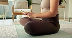 Hands, phone and texting with fitness in home on yoga mat with contact, scroll or rest for wellness. Woman, typing and check notification with mobile app, web or chat with break for exercise at house