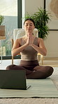 Meditation, namaste and asian woman with laptop in home for mindfulness or spiritual wellness. Calm, female person or inner peace with computer, zen or tutorial for fitness or health guide in house