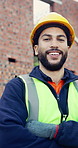 Architect, face and happy man with confidence on construction site for building maintenance. Portrait, male person or contractor with smile or arms crossed for architecture development or safety