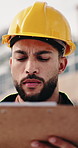 Man, engineer and reading in city with clipboard, inspection and quality control for construction. Thinking, person or checklist outdoor for architecture, urban evaluation and information for project