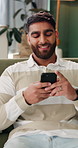Man, laugh and reading with phone on sofa for social media, text message or funny comment. Online chat forum, humor and communication app with person in living room of home for connection or comedy