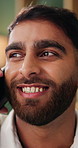 Phone call, communication and man with smile, connection and conversation on social network platform. Happy, talking and person with technology, digital chat and remote discussion on contact app.