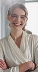 Arms crossed, face and smile with business woman in office for financial or investment consulting. About us, corporate and finance with happy consultant at work for accounting or wealth management